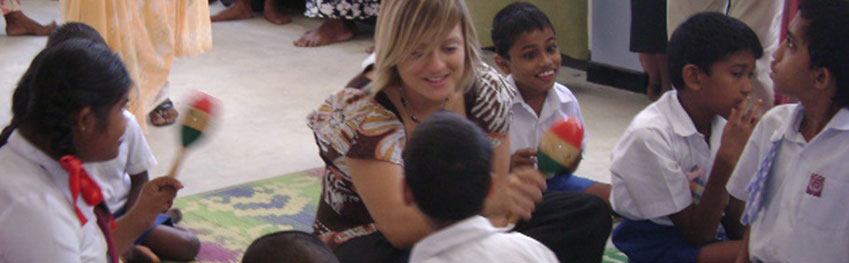 orphanage children with intern